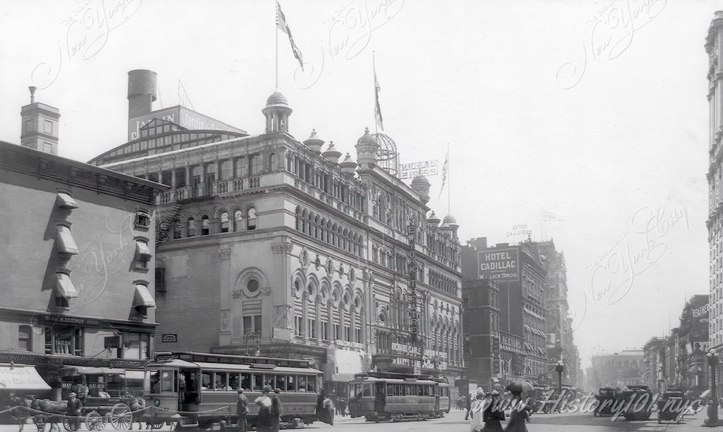 Photograph of Longacre (Times) Square shows the New York Theatre on left and Hotel Cadillac in the background.