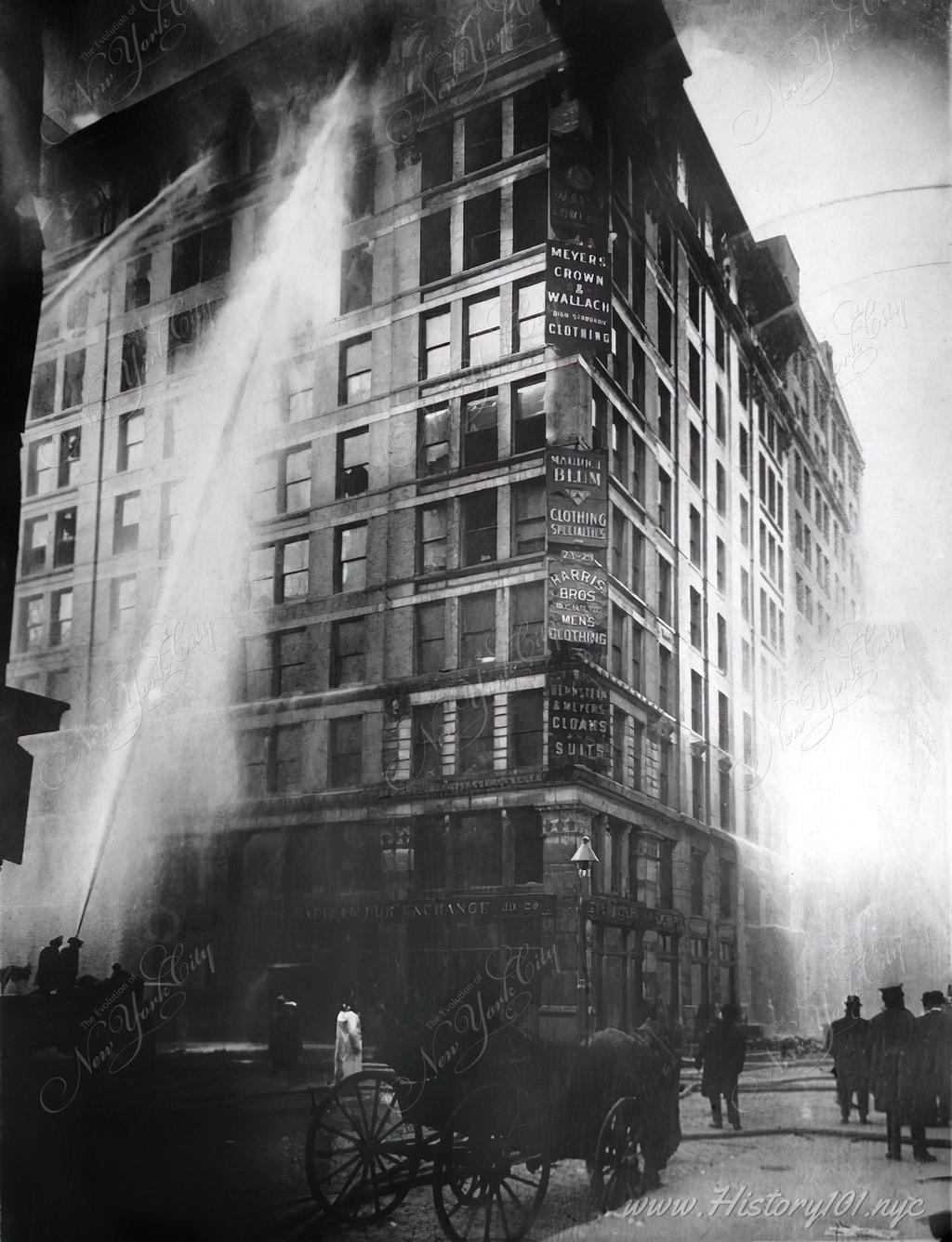 Photograph of firemen as they battle the fatal blaze which engulfed the Triangle Waist Company in flames, claiming 146 lives.