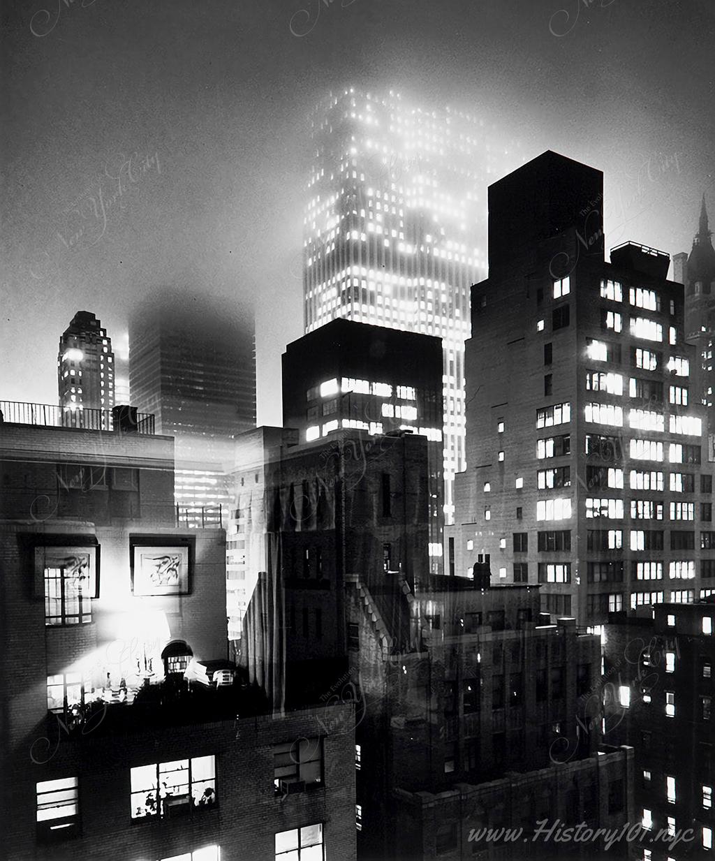 A nocturnal cityscape of skyscrapers and lights captured through an open window on Park Avenue.