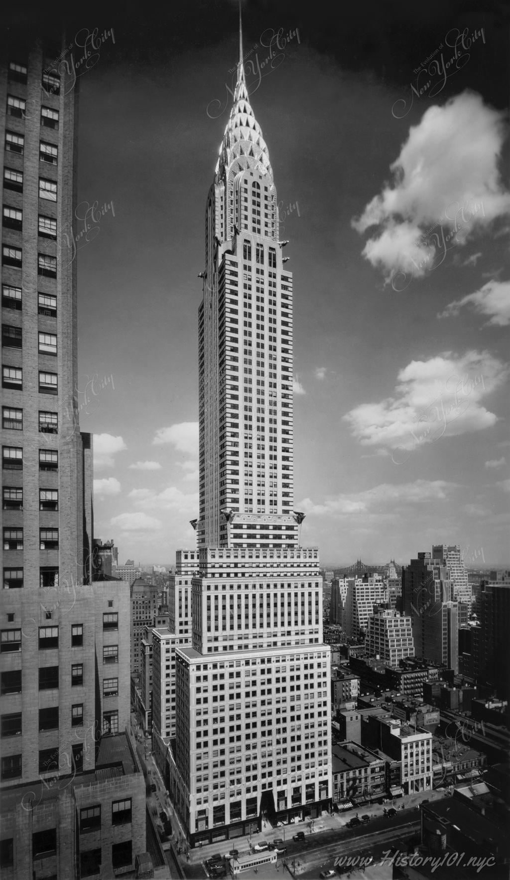 Full length photograph of The Chrysler Building at the intersection of 42nd Street and Lexington Avenue in Midtown Manhattan.