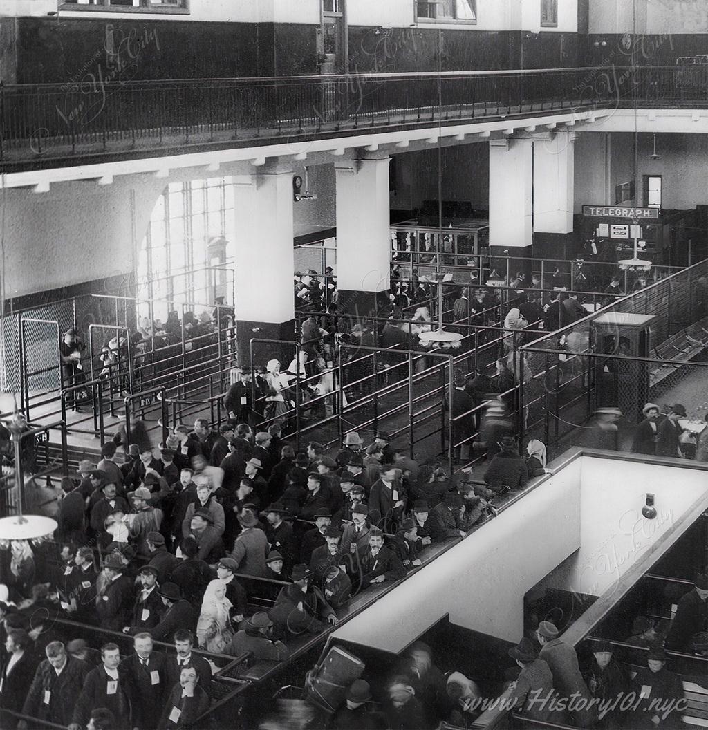 Immigrants waiting to be processed at Ellis Island. New York had become a Wonder City and beacon of hope for people all over the world.