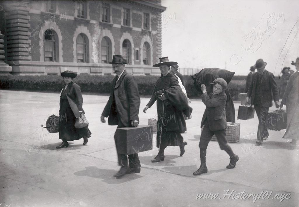 Immigrants arriving at Ellis Island for processing in 1907.