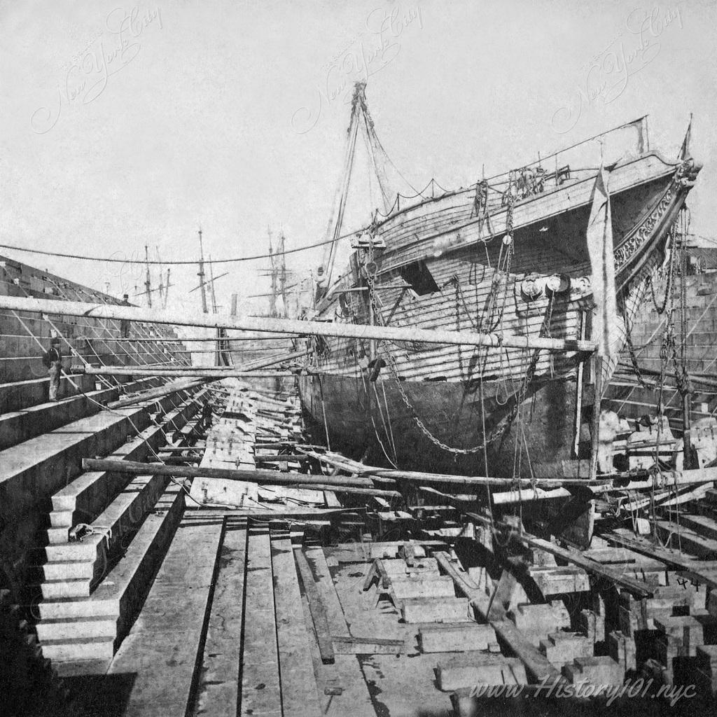 Silver photographic print of Brooklyn Navy Yard dry dock, which will be flooded as soon as the ship is completed and seaworthy.