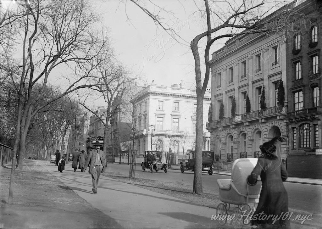 Photograph shows the James Speyer house, to the right, a mansion at 1058 Fifth Avenue, on the southeast corner of 87th Street,