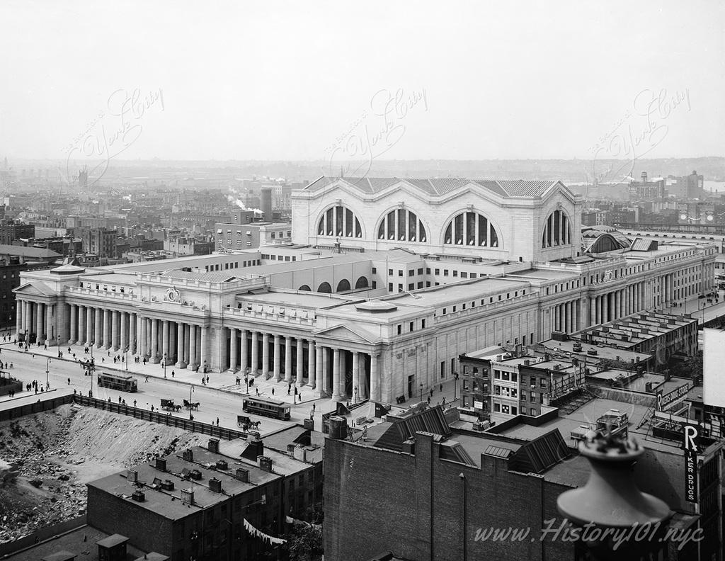 Aerial photograph of the newly completed Pennsylvania Station shows off the elaborate masonry and scale of this highly ambitious building.