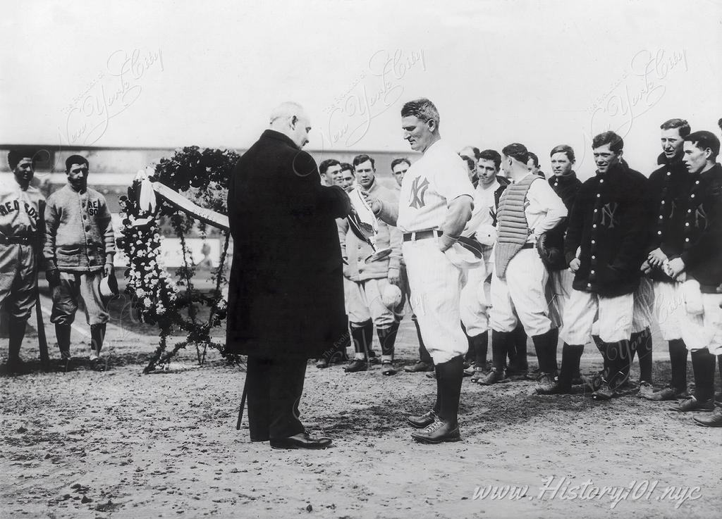 A photograph of Yankees president Frank Farrell making a presentation to team manager Harry Wolverton.