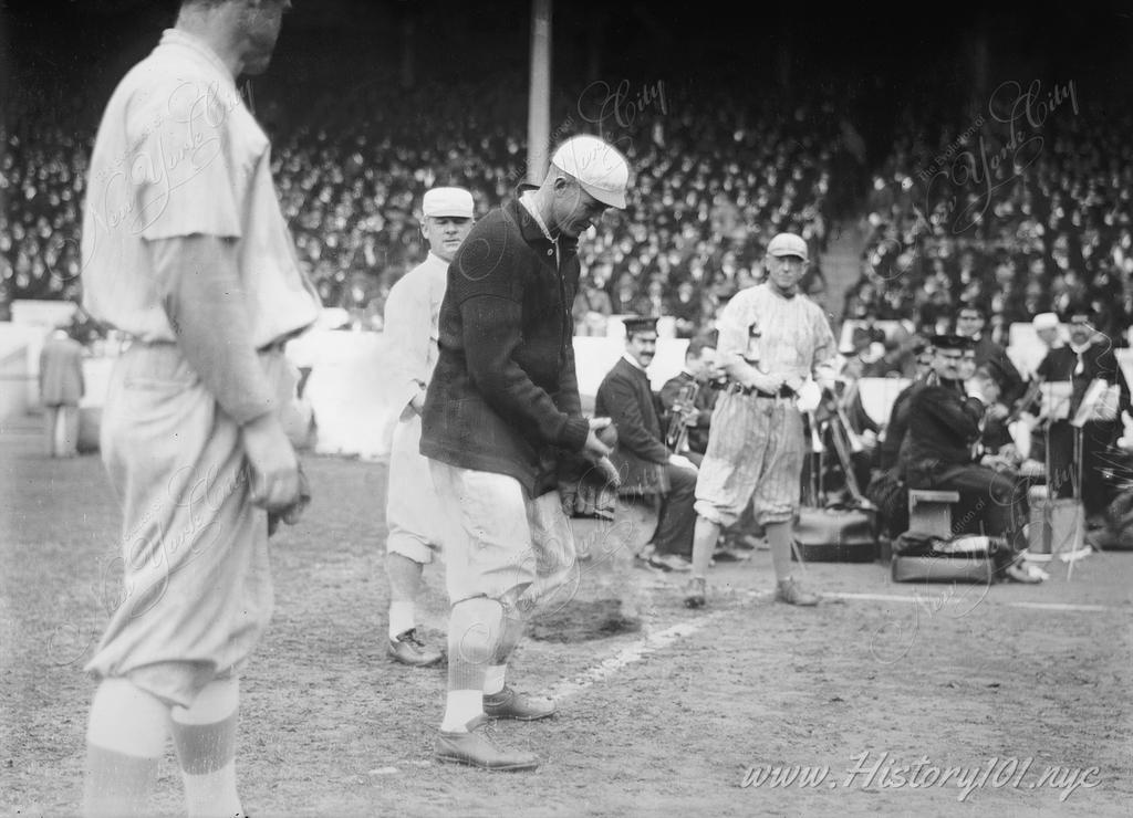 Photograph shows baseball players Christy Mathewson (New York NL) (center) and Jeff Tesreau (New York NL) (left) during a 1913 World Series game.