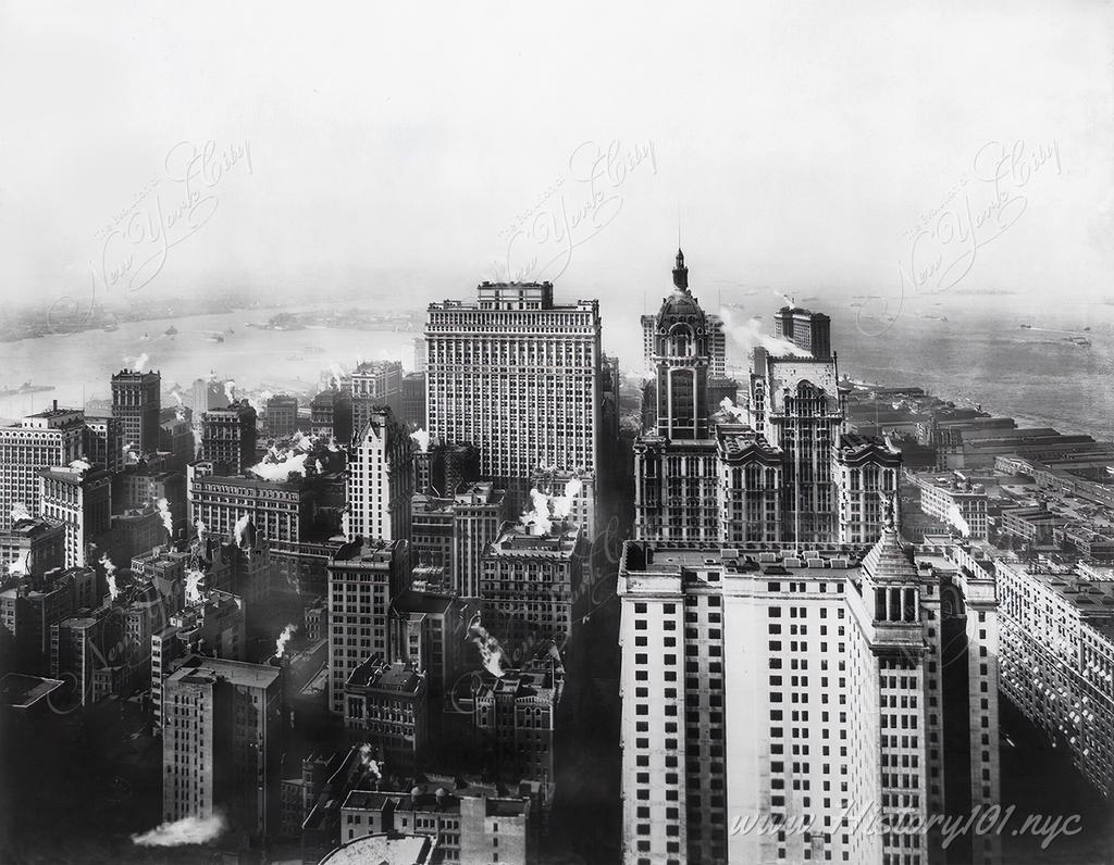 An aerial view looking towards the southern tip of Downtown Manhattan from the Woolworth Building, which was the tallest building in the world from 1913 to 1930.