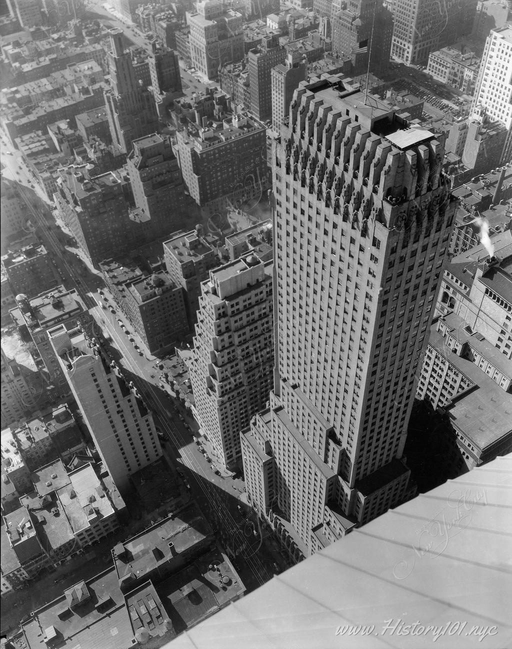 Photograph of the Chanin Building and midtown Manhattan from a bird's eye perspective, taken from the Chrysler Building.