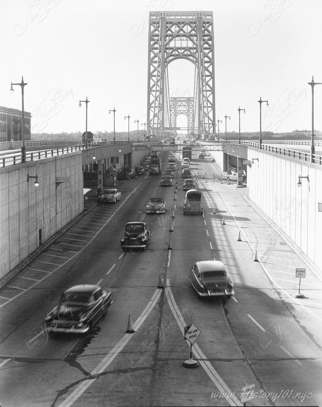 Photograph shows inbound and outbound traffic at the Manhattan side entrance of the George Washington Bridge, which was built in 1927.