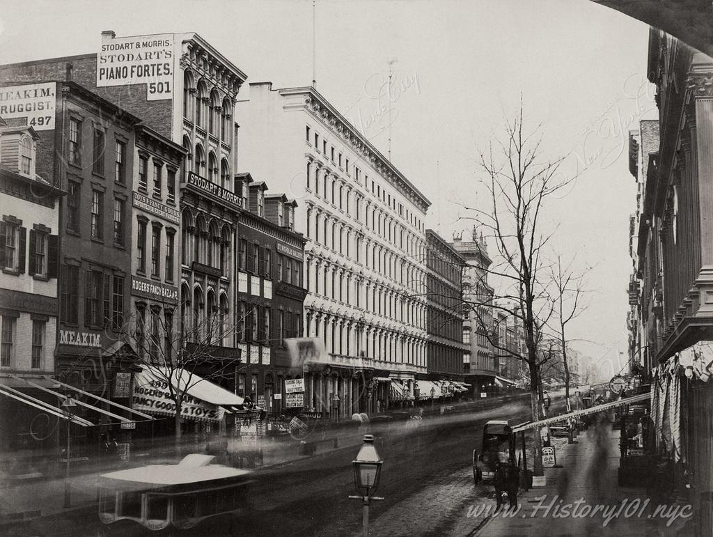 The East side of Broadway and Broome Street looking North, capturing the hum and activity of downtown Manhattan during a cold winter.