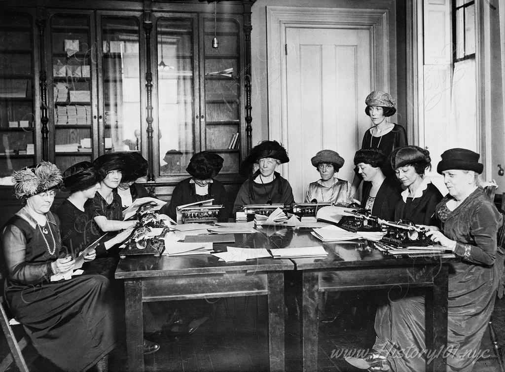 A group of New York women transcribing popular fiction into Braille for blinded ex-service man under the direction of the New York County Chapter ARC.