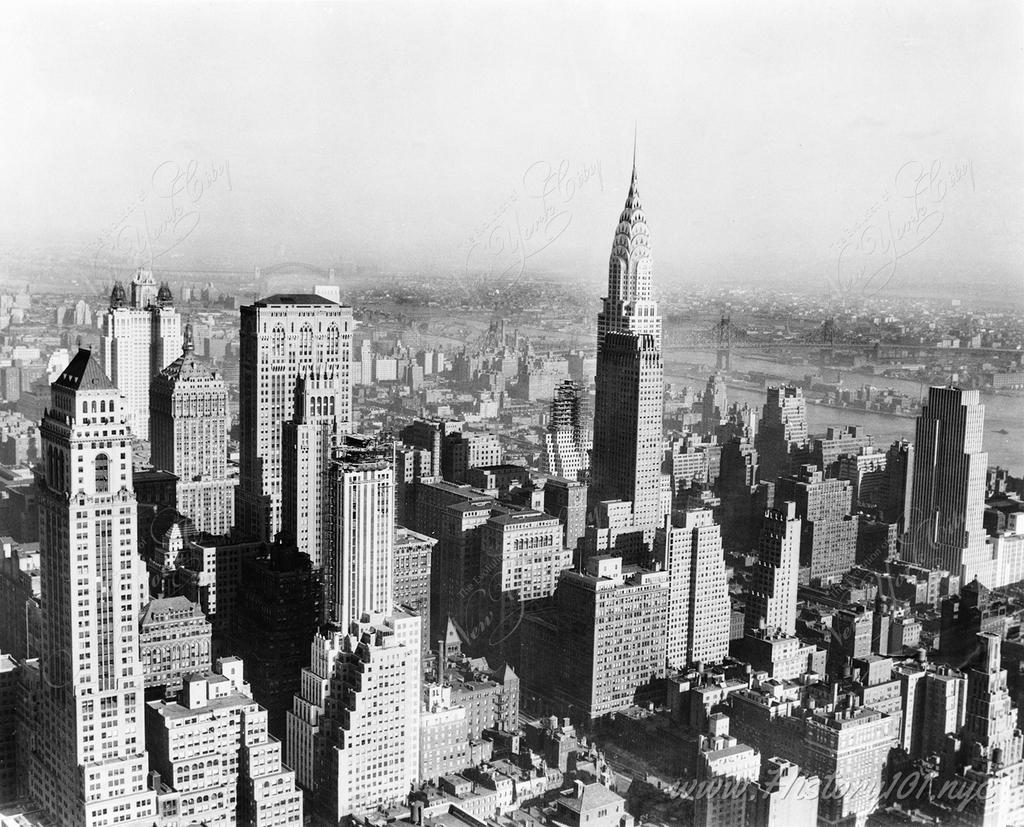 A bird-s eye perspective of Midtown Manhattan, looking northeast towards The Chrysler Building.