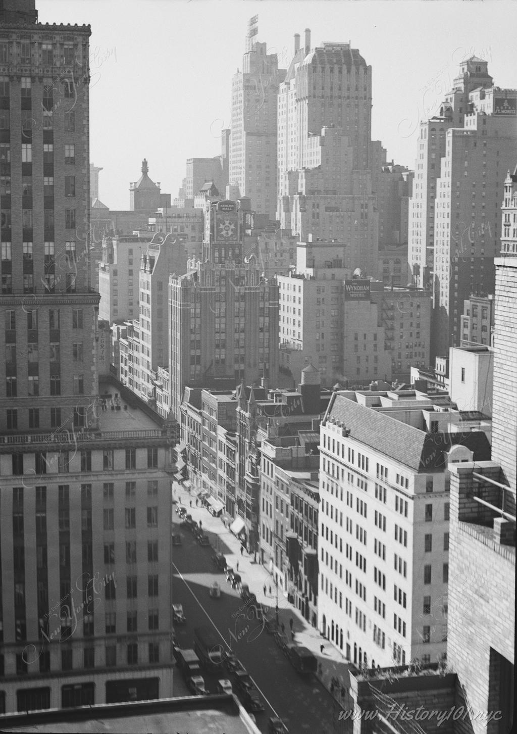 View looking west on 57th Street from Fifth Avenue. We see the south facade of the iconic Bergdorf Goodman building and the smaller buildings on the north side of 57th Street.