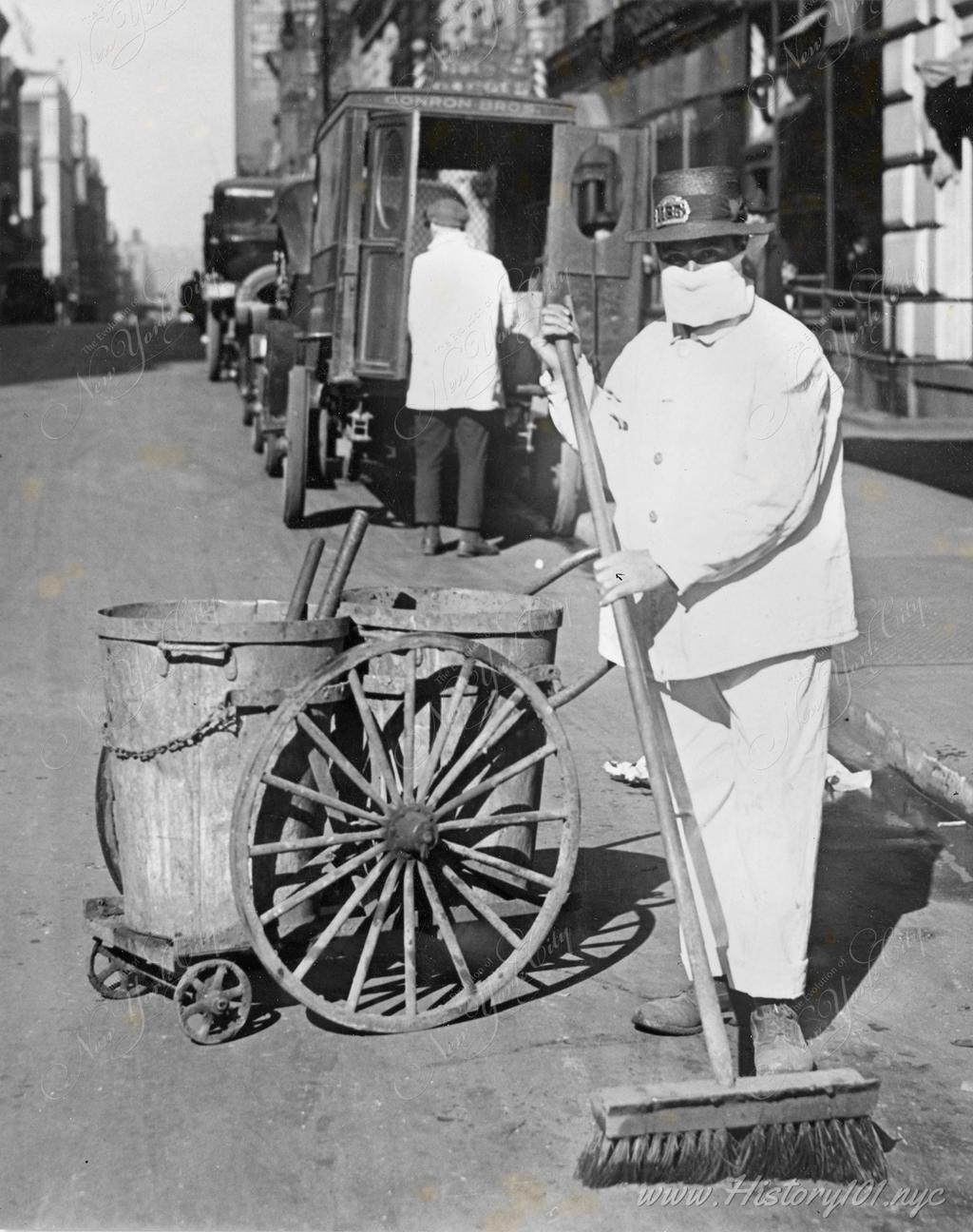 Mask worn by a street cleaner to check influenza spread. The catch phrase of the New York Health Board to wear masks has been headed: "Better ridiculous than dead"