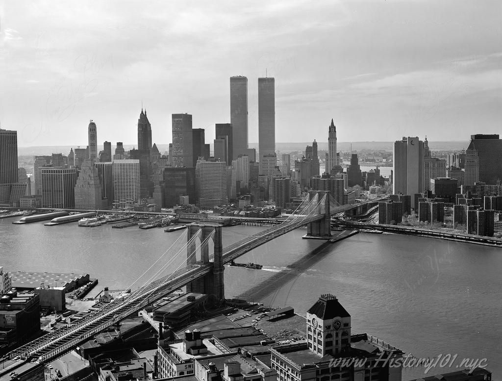 Aerial photograph of the Brooklyn Bridge over the East River.