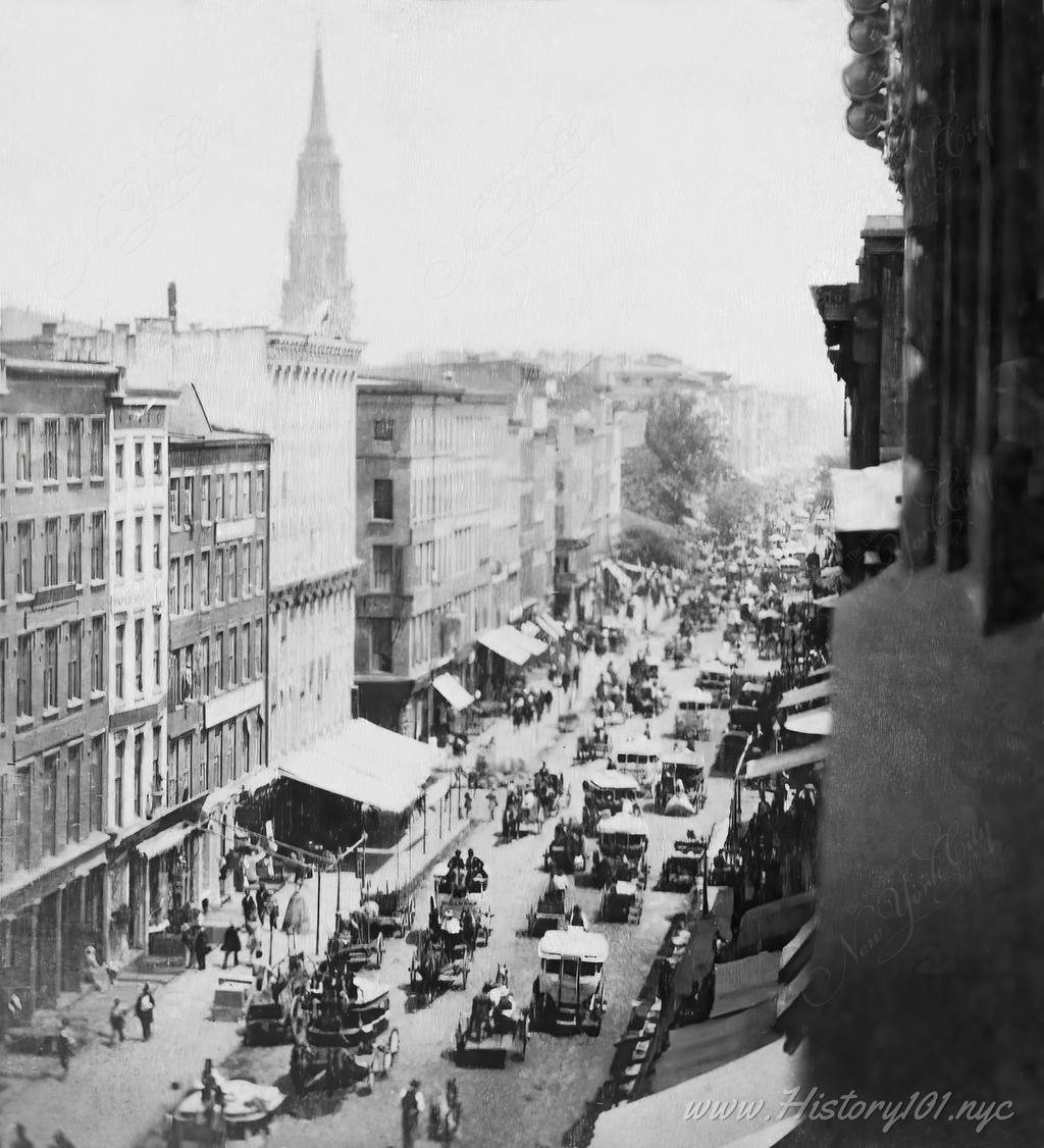 Discover 1865 NYC through Stacy's Broadway photo, capturing the city's vibrant streets and commercial evolution