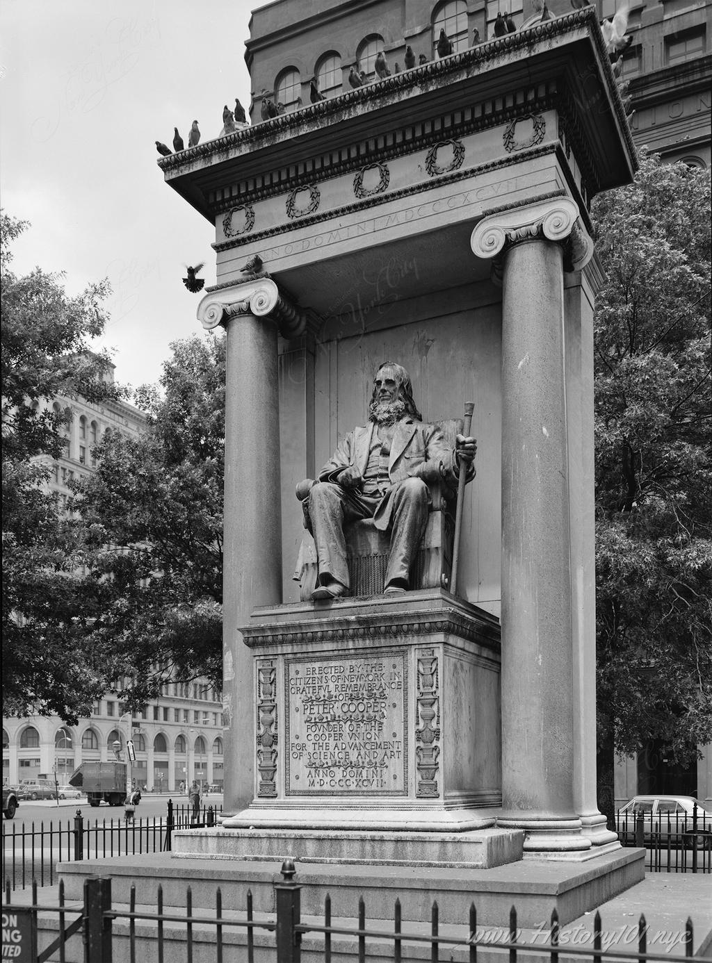 Photograph of the Peter Cooper Statue overlooking Astor Place.