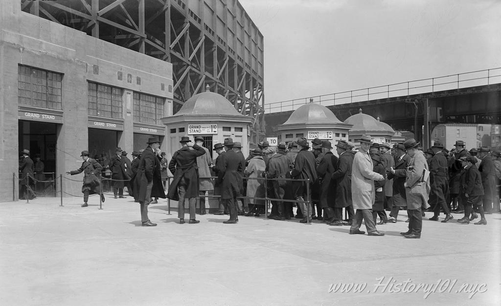Photograph of fans waiting to buy their ticket at the right field rgandstand of Yankee Stadium.