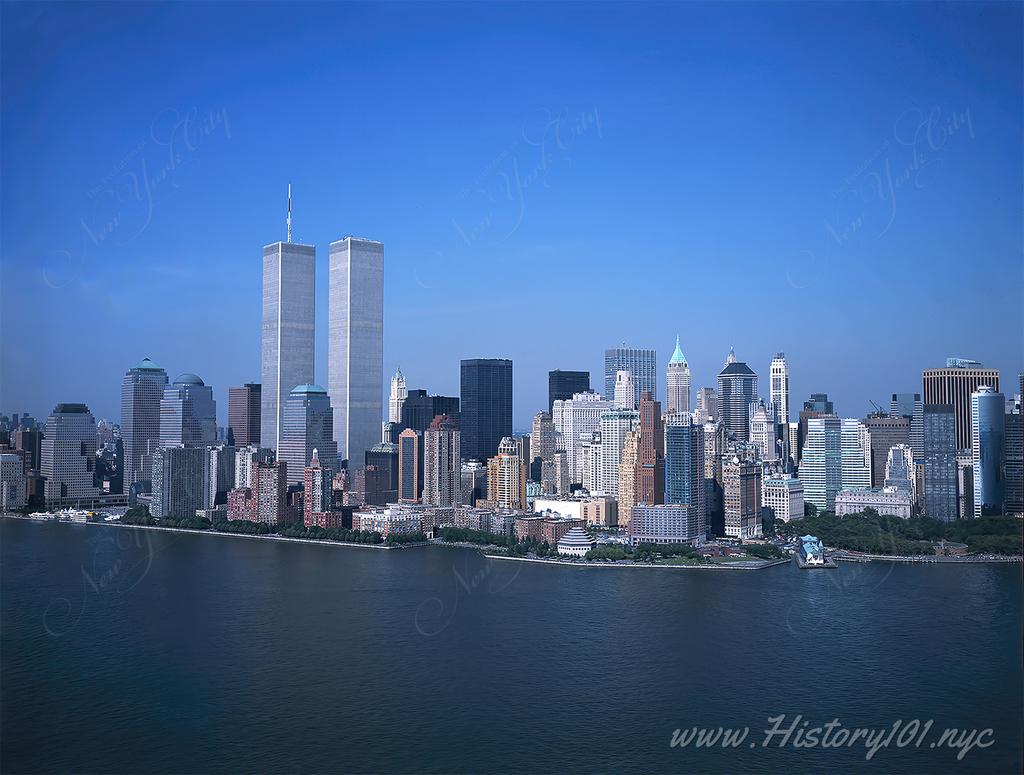 Explore the 1980 Lower Manhattan skyline, featuring the towering World Trade Center, a symbol of NYC's architectural and economic prowess