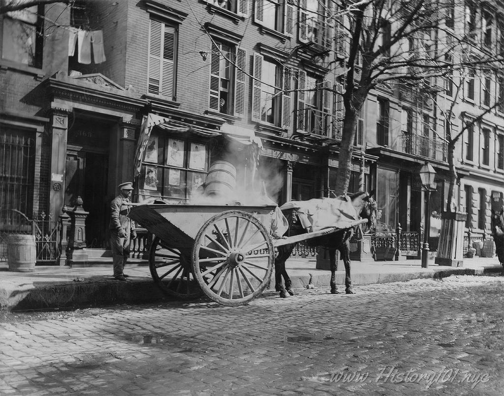 Photograph of a horse drawn cart and a man collecting ashes from local furnaces.