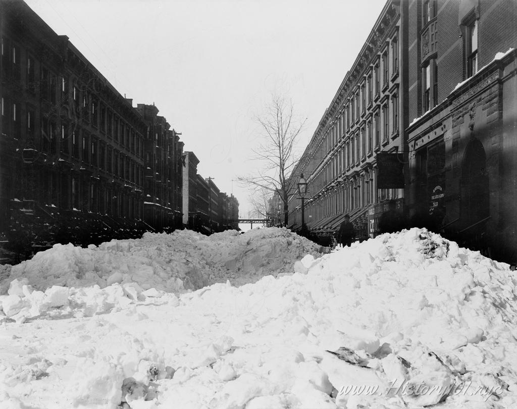 Photograph of a Harlem street covered in snow after the blizzard of Feb. 13, 1899.
