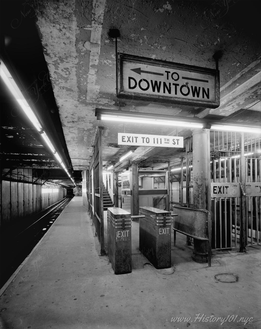 Photograph of the 110th Street and Lenox Avenue Station platform and control area.
