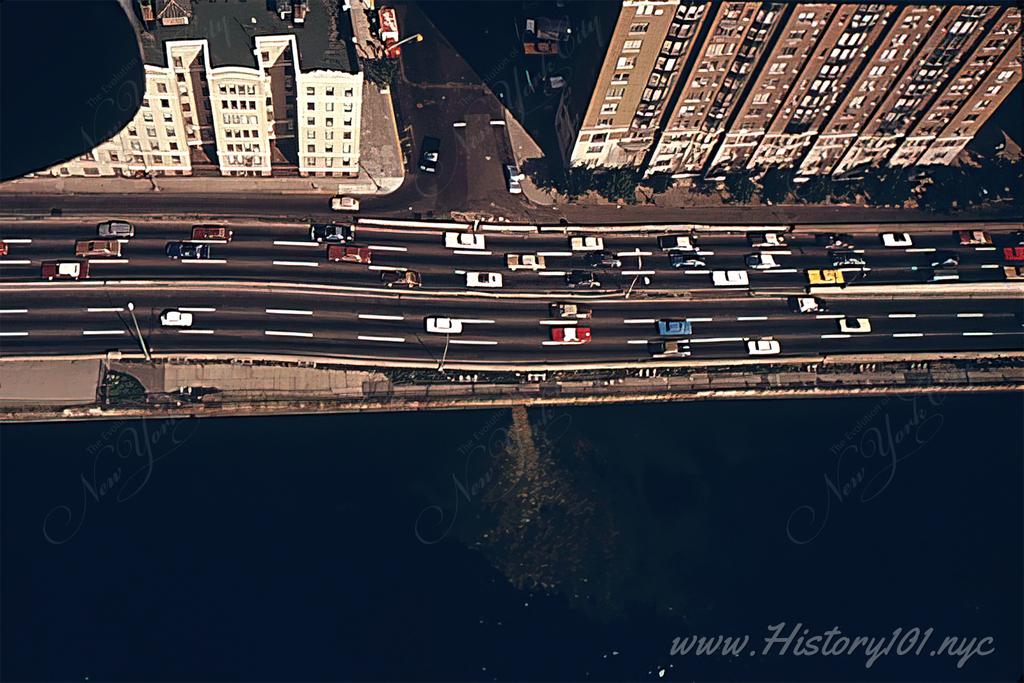 Aerial photograph of untreated sewage spilling into the East River along 79th Street and The FDR Drive. 