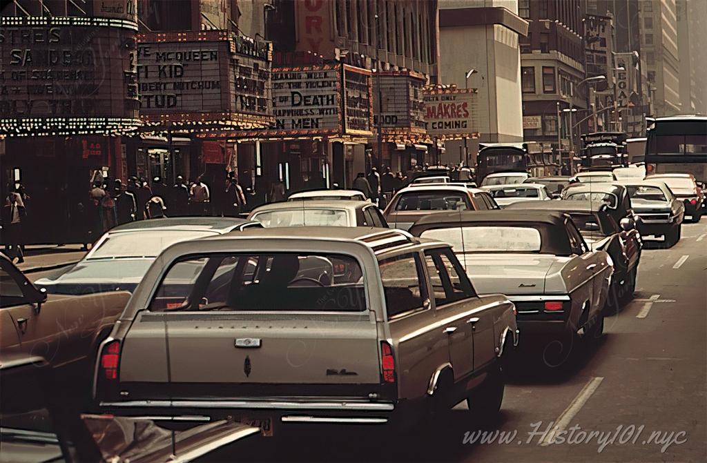Photograph of gridlock traffic in the heart of Midtown Manhattan, on 42nd Street between 7th and 8th Avenues.