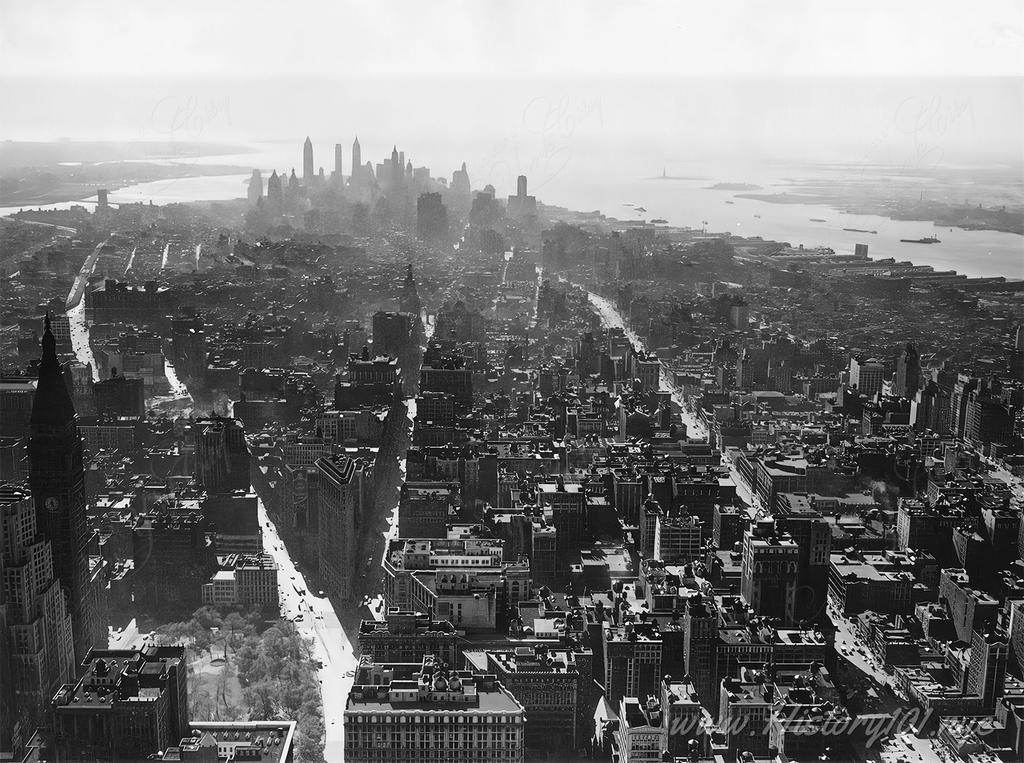 Aerial photograph of Manhattan, looking south towards the downtown skyline. The Hudson River is also visible on the right.