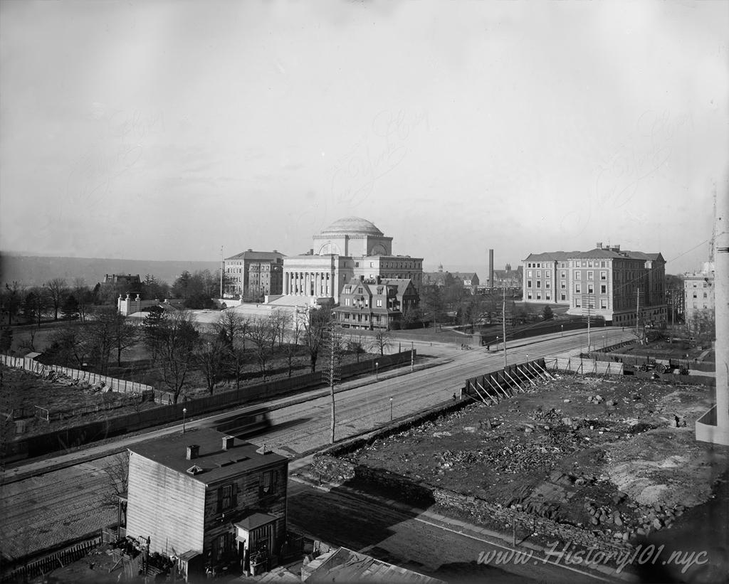 An aerial view of Columbia University campus, including Low Library and Milbank Hall.