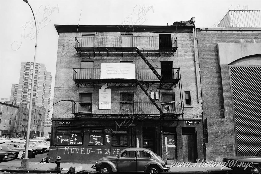 Built at the corner termination of a three store row on Peck Slip for Jasper Ward in 1807, this Federal style building stood next to one of the most important and longest lasting slips in New York City. Like most of the other seaport buildings, 45 Peck Slip became part of the fish market in the late 19th century.