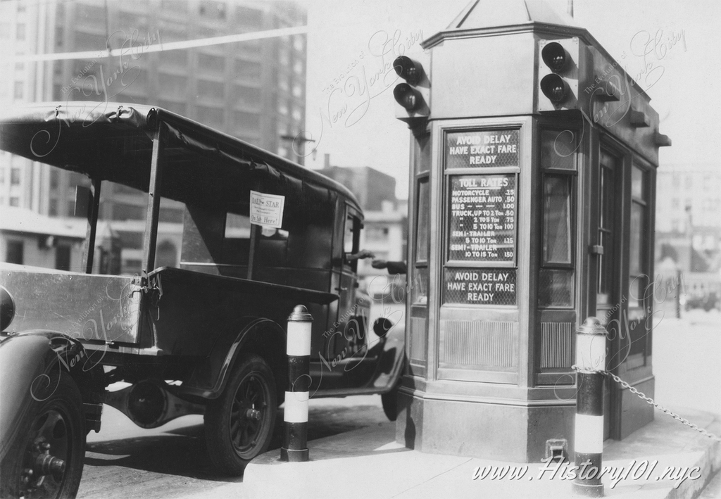 Toll booth in operation at entrance to Holland Tunnel in New York City on U. S. Route 1