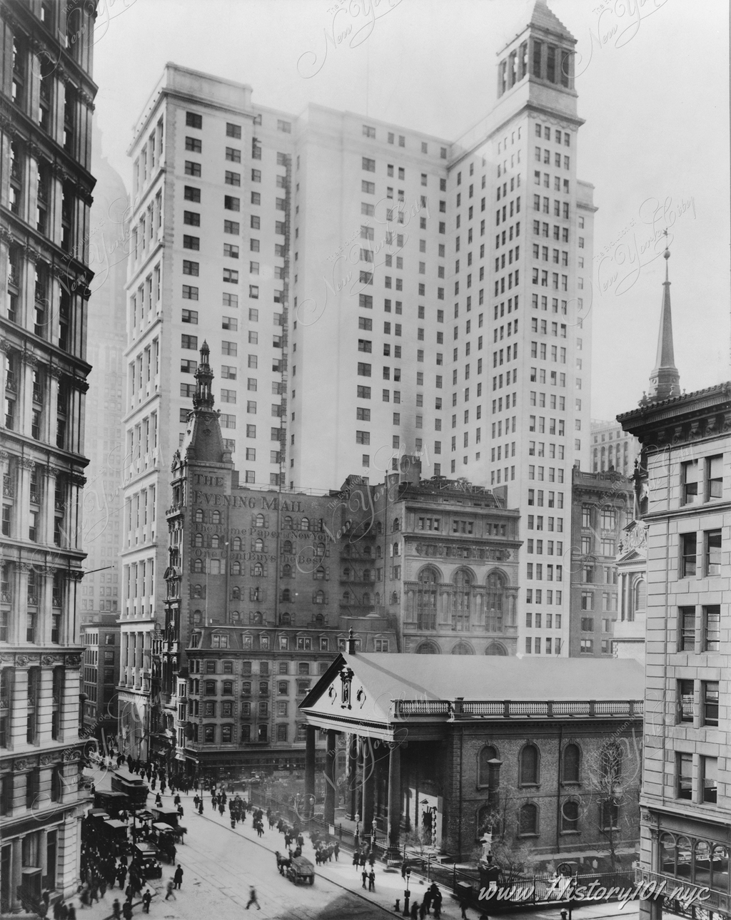 Photograph of the corner of Broadway and Fulton Street. The Telephone and Telegraph Building was designed by architect William Welles Bosworth and opened in 1916.