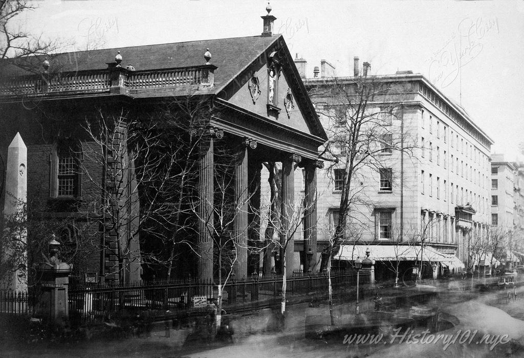 Photo of Saint Paul’s Chapel - the oldest surviving public building in Manhattan. Also pictured is Astor House - the city's grandest hotel in the mid-1800s.