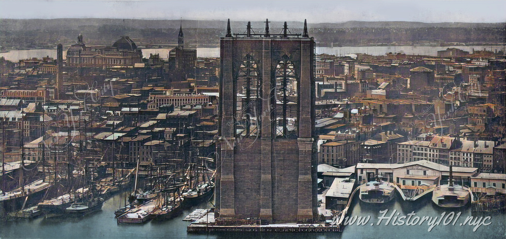 This historical photograph shows one of the completed towers of the Brooklyn Bridge, before the suspension cables and bridge were added.