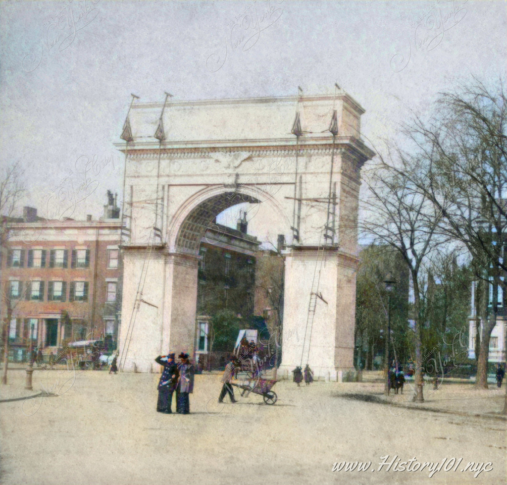 Photograph of The Washington Square Arch in its final stages of construction. The arch is a historic monument located in Washington Square Park.